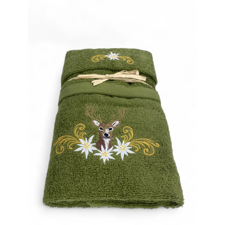 Green cotton bath towels with embroidered deer and golden decorations