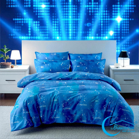 Housse de couette bleue « Sleep Time » avec signes du zodiaque sur le lit