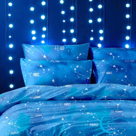 Pillowcase detail with Aries and Gemini symbols – astrological design